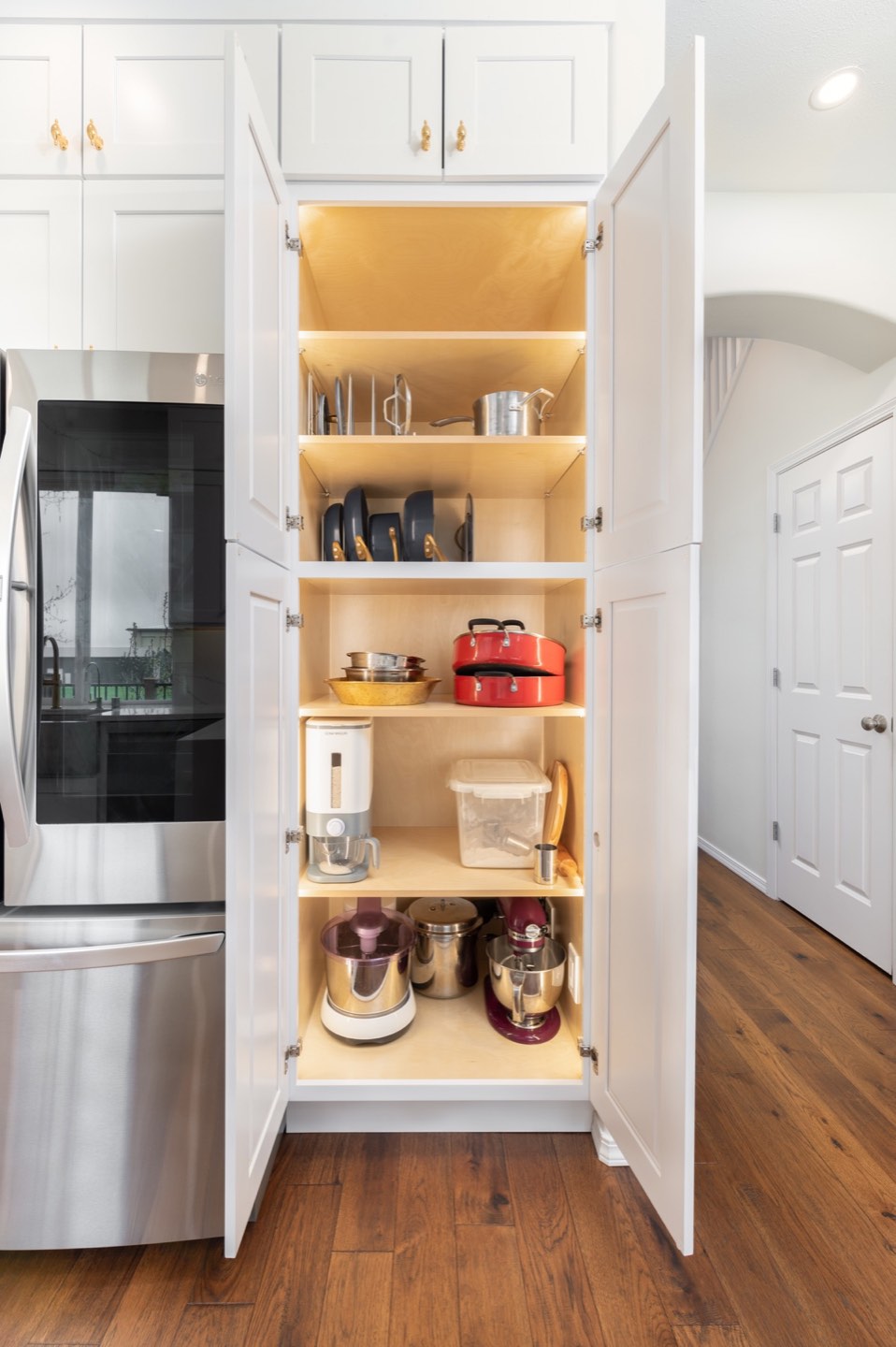 Completed LeviArs kitchen with coordinated cabinetry, countertops and flooring