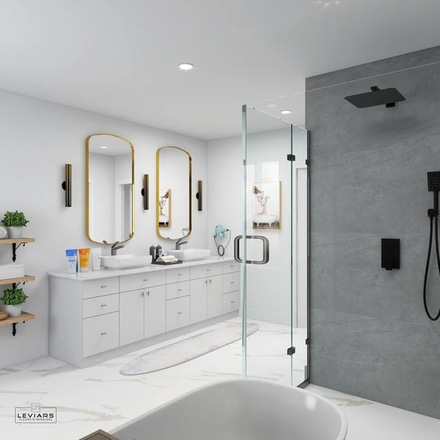 Glass shower enclosure beside a white vanity and freestanding tub