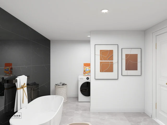 Bathroom with dark tiled wall, freestanding tub and framed artwork