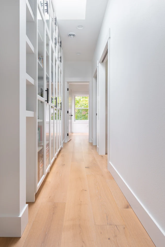 Kitchen storage and transition into the adjoining hall