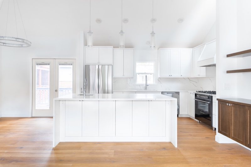 Modern living room fireplace remodel with coordinated interior finishes, view 5 of 8