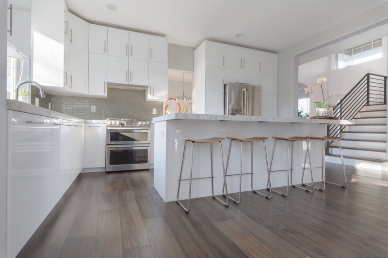 Flooring and staircase remodeling with coordinated treads, landings and transitions, view 1 of 16