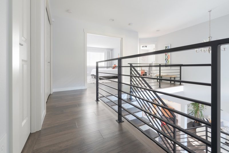 Flooring and staircase remodeling with coordinated treads, landings and transitions, view 3 of 16