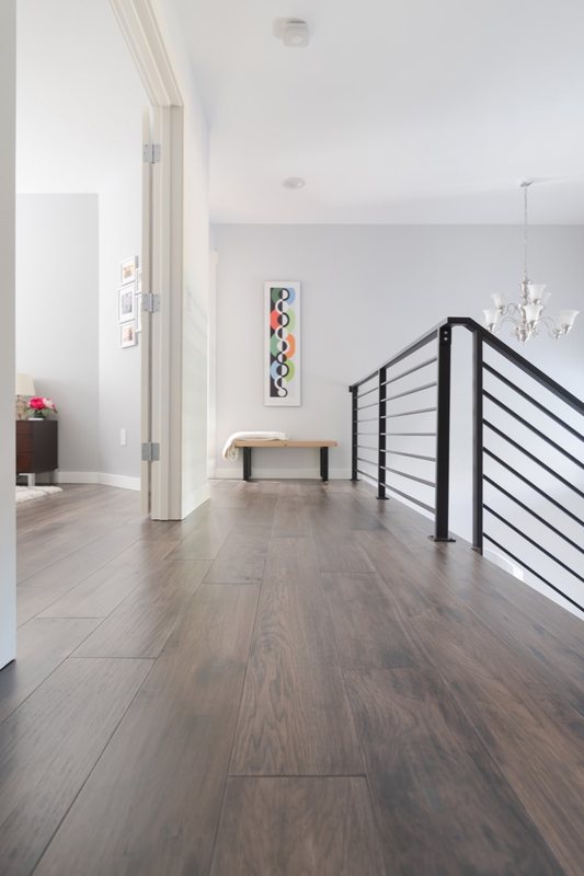 Flooring and staircase remodeling with coordinated treads, landings and transitions, view 6 of 16
