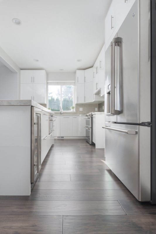 Flooring and staircase remodeling with coordinated treads, landings and transitions, view 9 of 16
