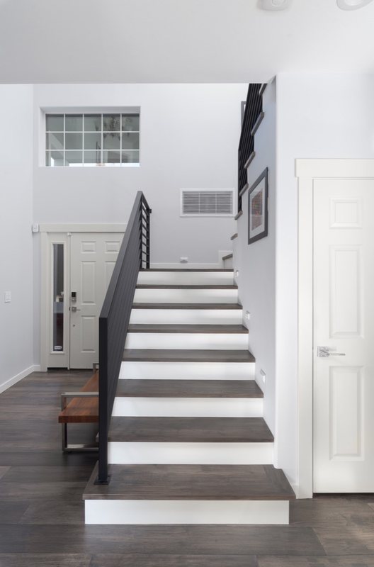 Flooring and staircase remodeling with coordinated treads, landings and transitions, view 10 of 16