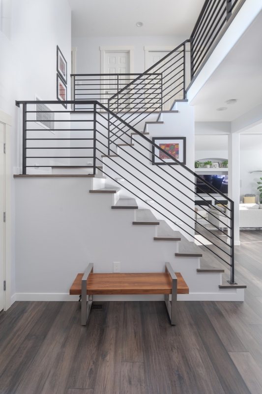 Flooring and staircase remodeling with coordinated treads, landings and transitions, view 11 of 16