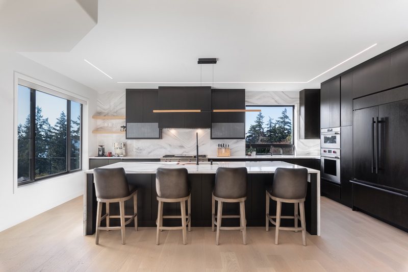 Coordinated kitchen, fireplace and staircase remodeling detail, view 1 of 25