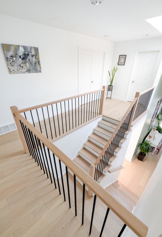 Coordinated kitchen, fireplace and staircase remodeling detail, view 6 of 25