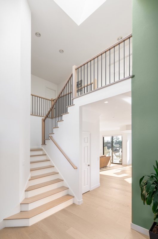 Coordinated kitchen, fireplace and staircase remodeling detail, view 8 of 25