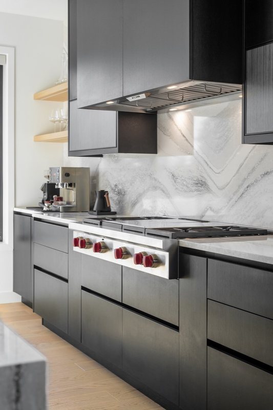 Coordinated kitchen, fireplace and staircase remodeling detail, view 11 of 25