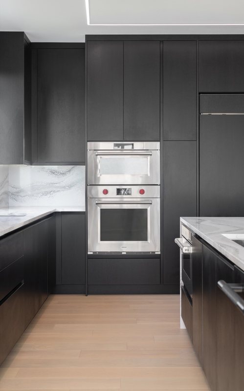 Coordinated kitchen, fireplace and staircase remodeling detail, view 12 of 25