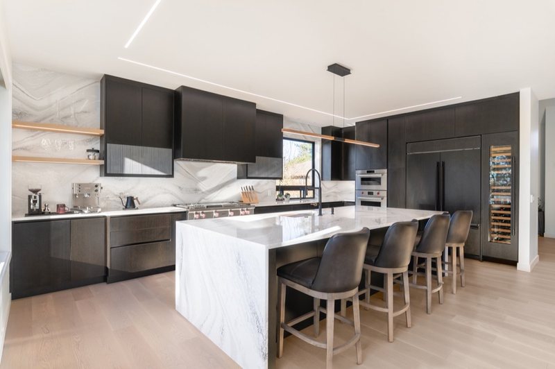 Coordinated kitchen, fireplace and staircase remodeling detail, view 17 of 25