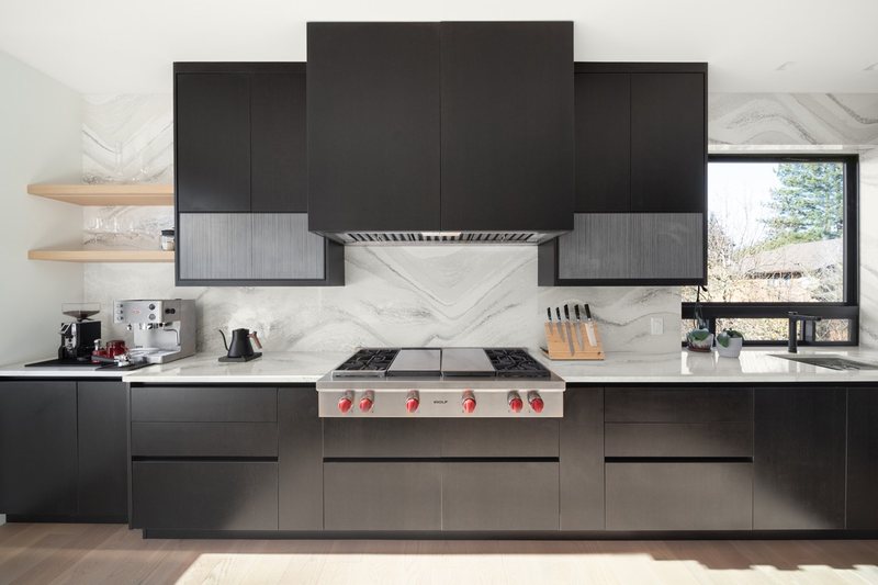Coordinated kitchen, fireplace and staircase remodeling detail, view 21 of 25