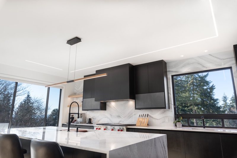 Coordinated kitchen, fireplace and staircase remodeling detail, view 22 of 25