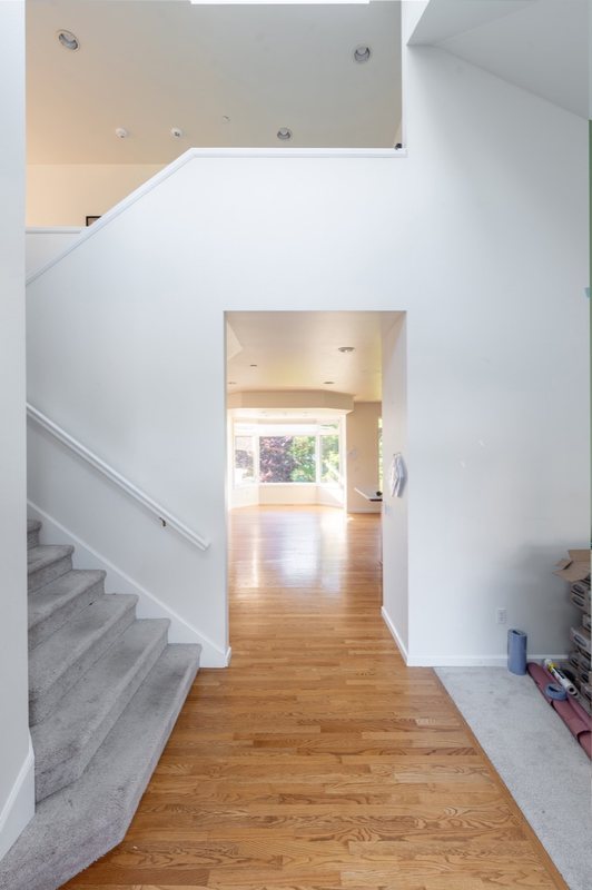 Coordinated kitchen, fireplace and staircase remodeling detail, view 23 of 25