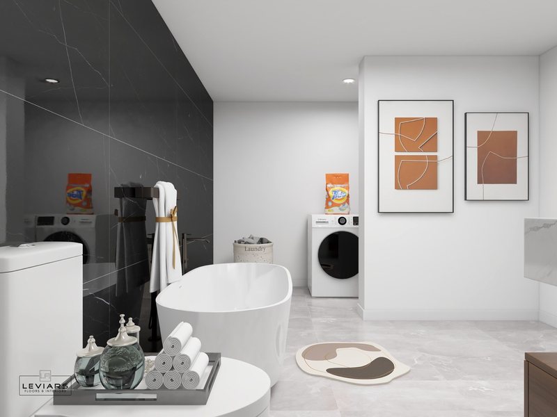 Modern primary bathroom with dramatic stone surfaces and freestanding tub, view 1 of 14