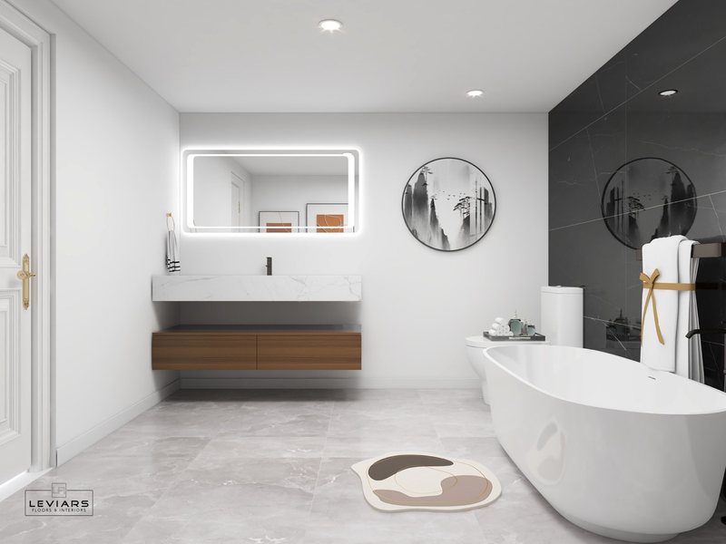 Modern primary bathroom with dramatic stone surfaces and freestanding tub, view 2 of 14