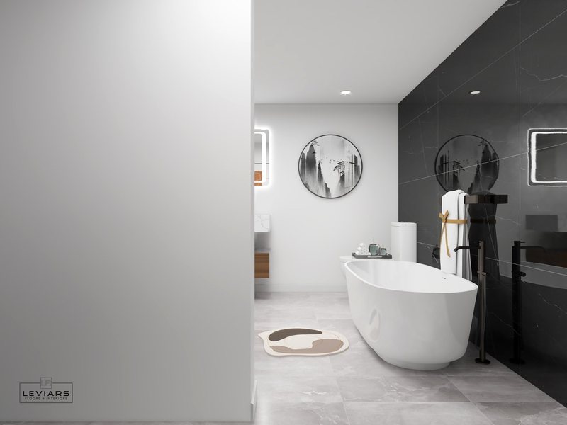 Modern primary bathroom with dramatic stone surfaces and freestanding tub, view 3 of 14