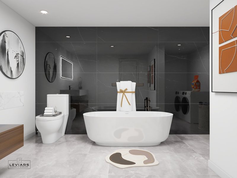 Modern primary bathroom with dramatic stone surfaces and freestanding tub, view 4 of 14