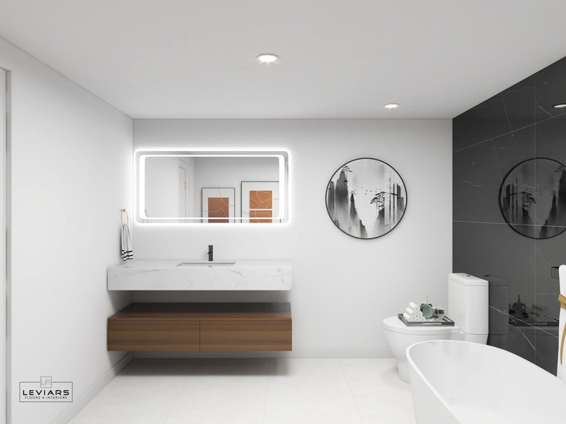 Modern primary bathroom with dramatic stone surfaces and freestanding tub, view 10 of 14