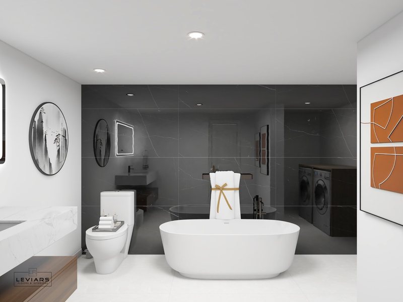 Modern primary bathroom with dramatic stone surfaces and freestanding tub, view 13 of 14