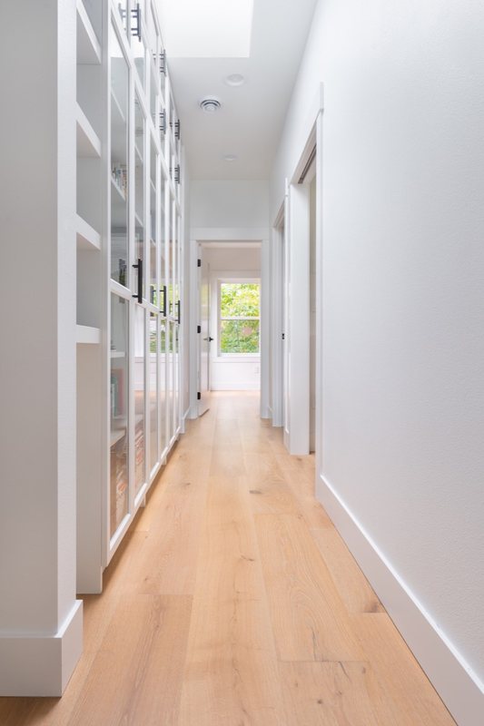 Kitchen storage and transition into the adjoining hall