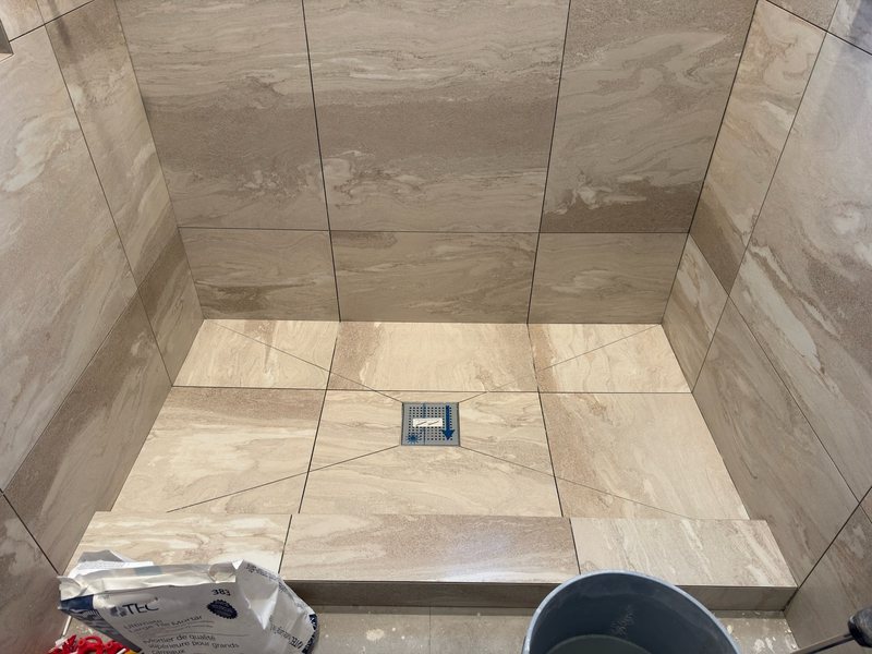 Shower floor tile and square drain installation