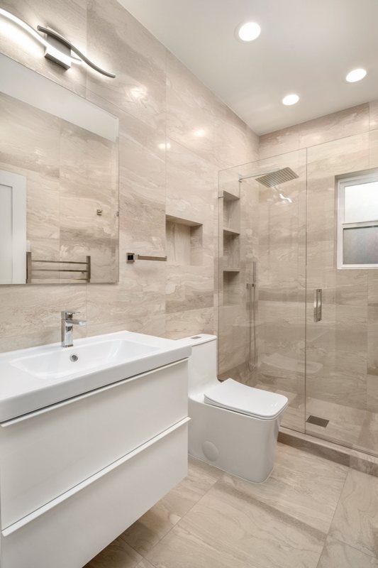 Completed vanity and bathroom tile finishes