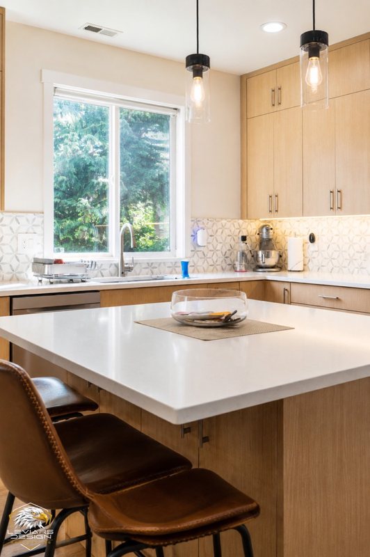 Natural-wood kitchen with white island countertop, pendant lights and coordinated cabinetry, view 5 of 20