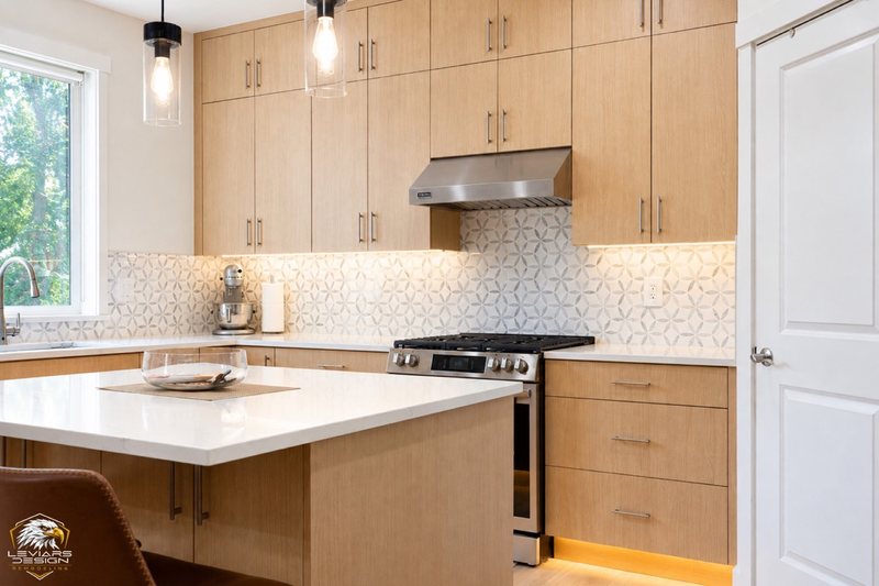 Natural-wood kitchen with white island countertop, pendant lights and coordinated cabinetry, view 14 of 20