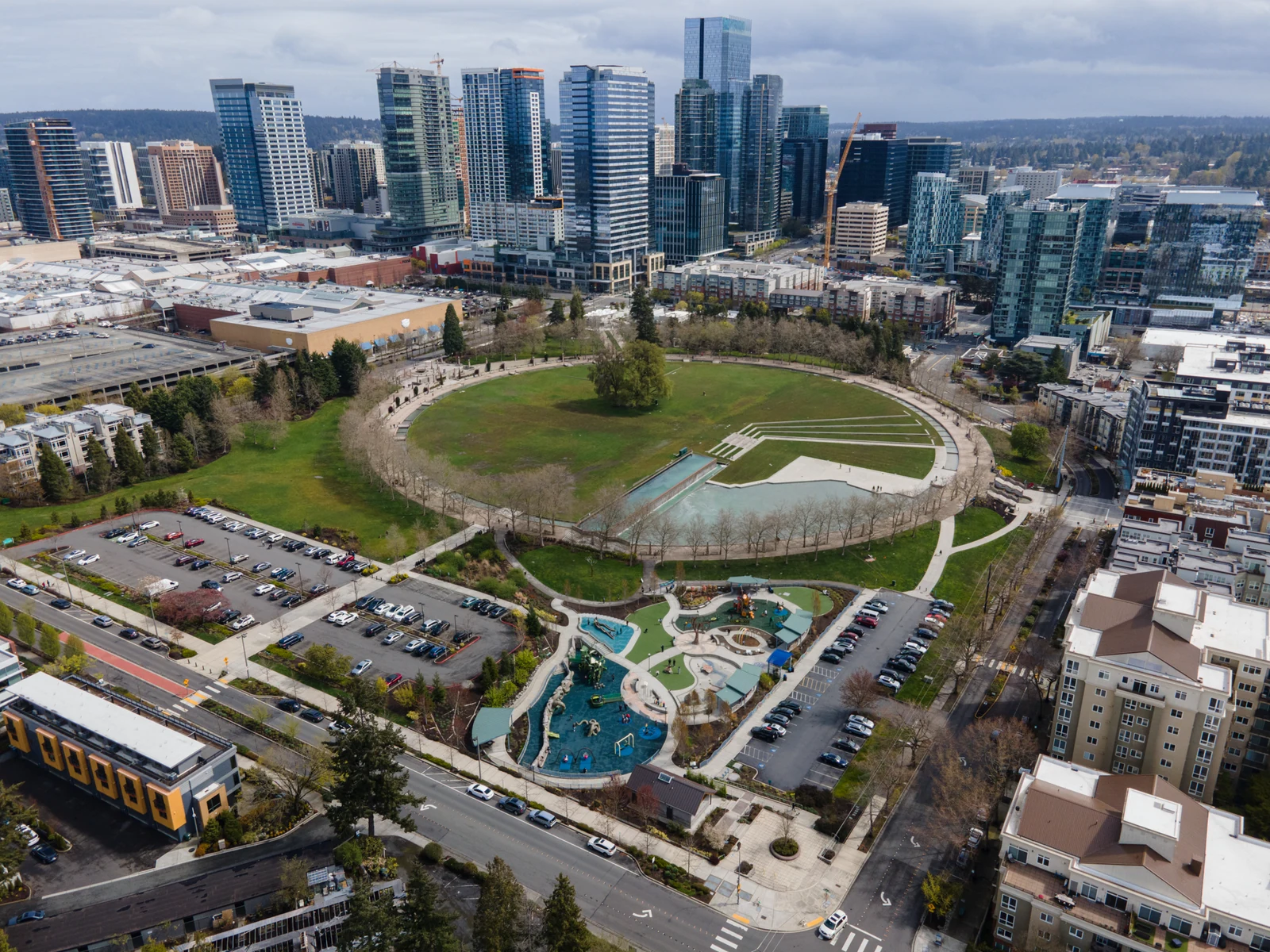 Bellevue Downtown Park and its circular promenade beneath the city's high-rise skyline. LeviArs Design & Remodeling service area.